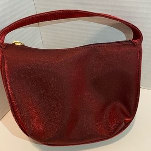 A red, Versace makeup bag